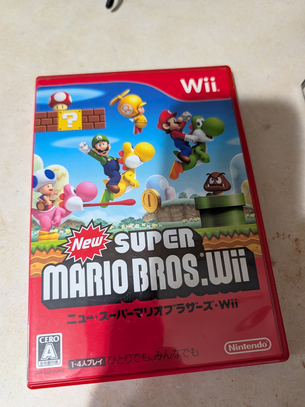 Japanese Nintendo New Super Mario Bros. Wii – Red and Multicolor Cover